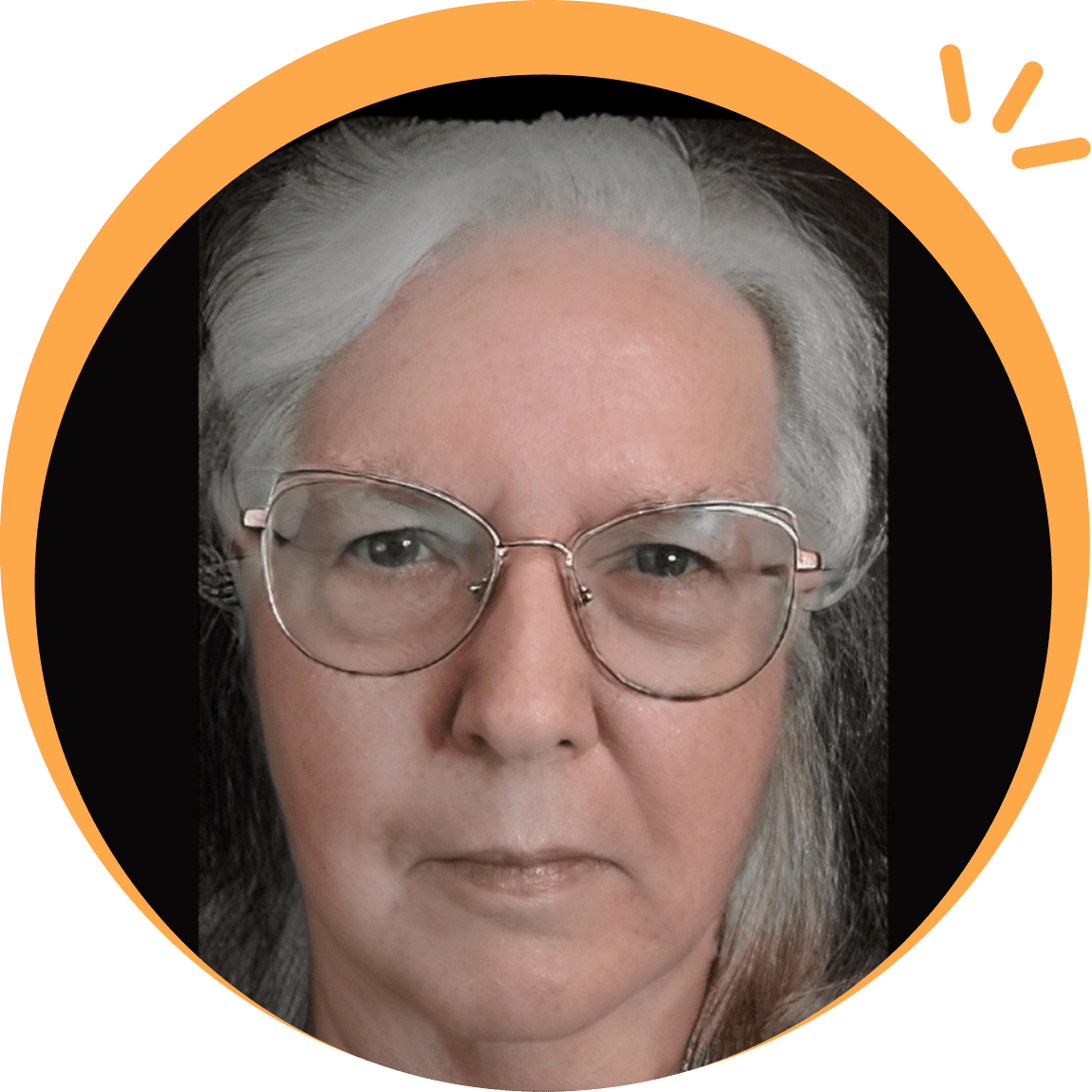 11 Portrait of an elderly woman with glasses and gray hair.